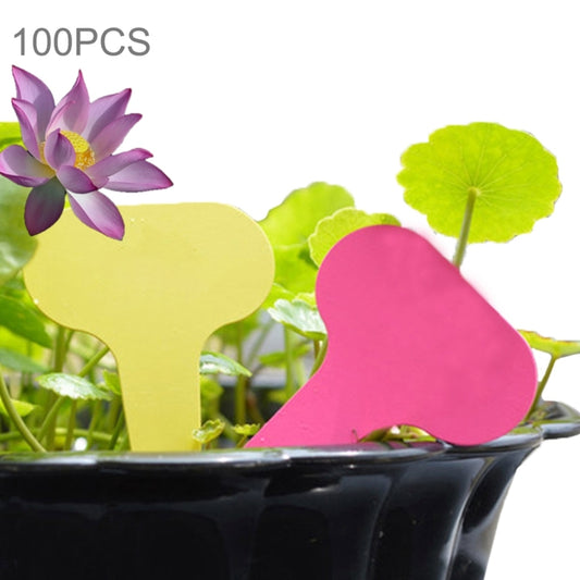 Yellow and pink heart-shaped plant label cards with peg-style tips