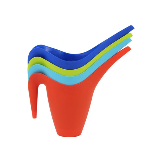 Stacked plastic watering pots in blue, green, yellow, and red with long spouts
