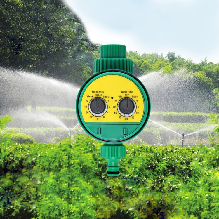 Green digital garden water timer with LCD dial and two control knobs