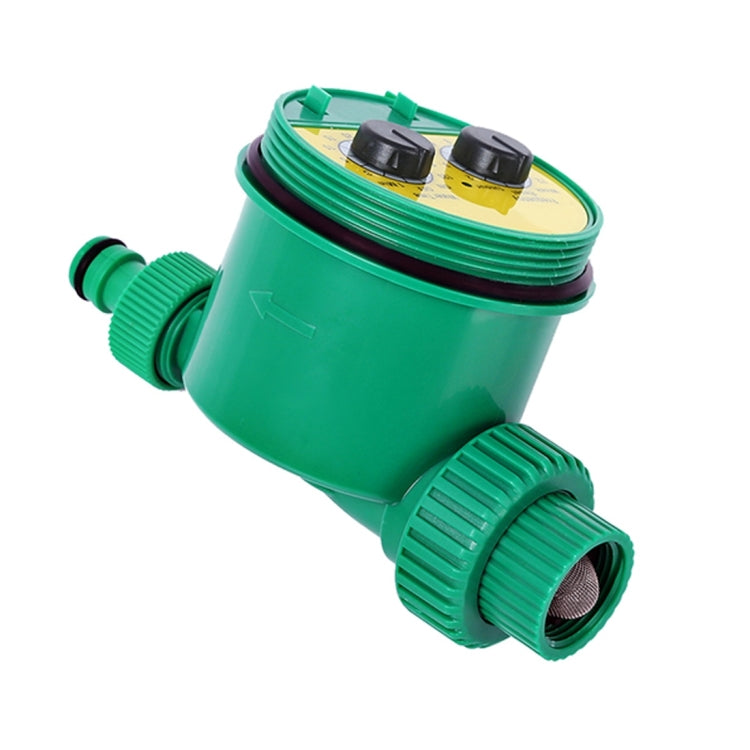 Green water timer valve with two dial controls on top and threaded inlet/outlet