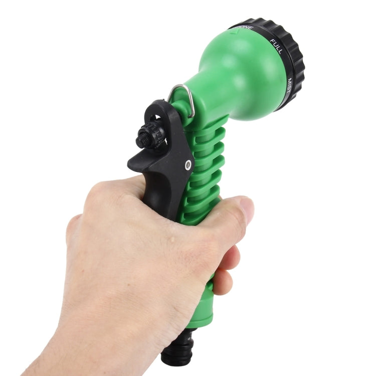 Handheld green garden water spray gun with black trigger and round nozzle selector