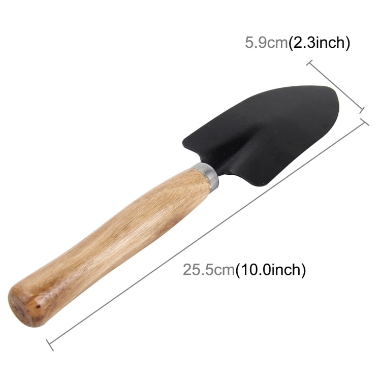 Mini garden spade with black metal blade and light wood handle, about 10 in long