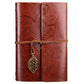 Brown leather-look travel diary notebook with leaf embossed cover, wrap strap, and gold leaf charm