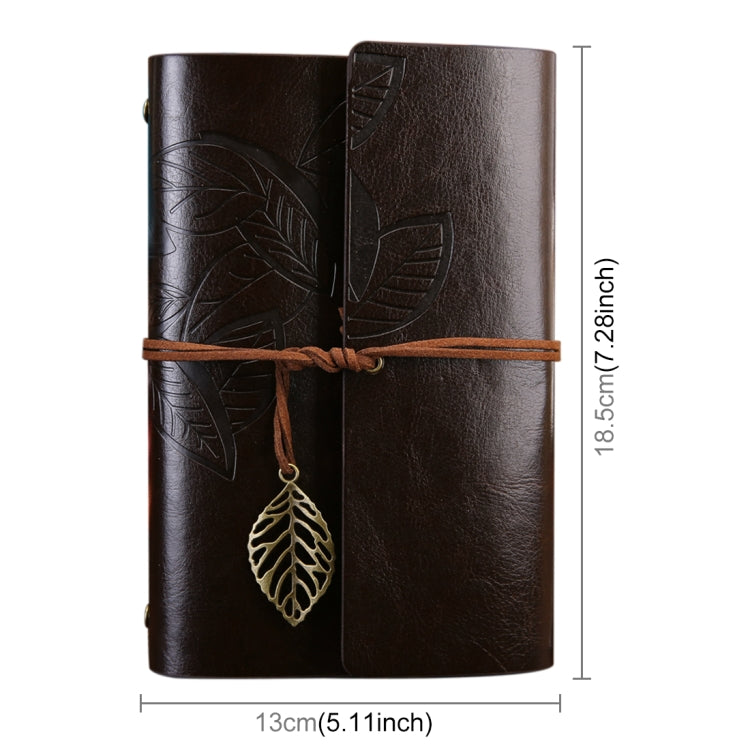 Brown faux-leather travel diary notebook with embossed leaves, leather strap, hanging leaf charm