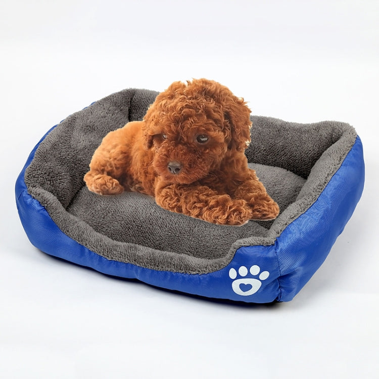 XXL dog kennel mat with grey plush top and blue base, white paw logo