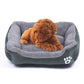 XXL dog kennel mat with grey plush top and dark green base, white paw logo