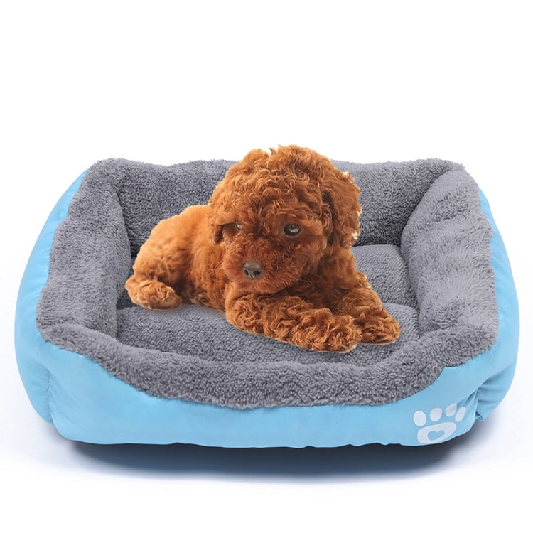 XXL dog kennel mat with grey plush top and blue base, white paw logo