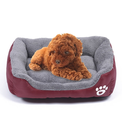 Wine-red and gray teddy-fleece dog kennel mat with cushioned bolsters and paw print
