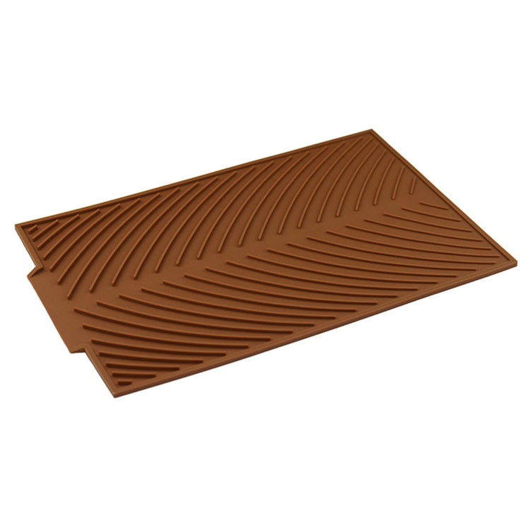 Brown silicone drain mat with ridged channels, foldable design