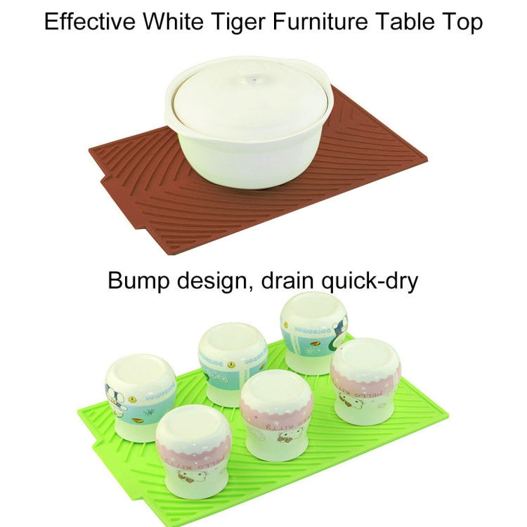 Brown silicone water filter mat holding white cups on ridged surface