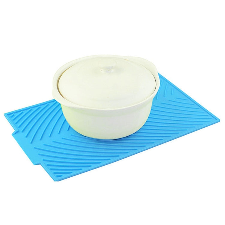 Blue silicone foldable water filter mat with white container and lid