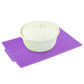 Purple silicone foldable water filter mat with white container on ridged base