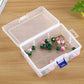 Clear plastic jewelry organizer box with open lid, 6 compartments, bead jewelry inside