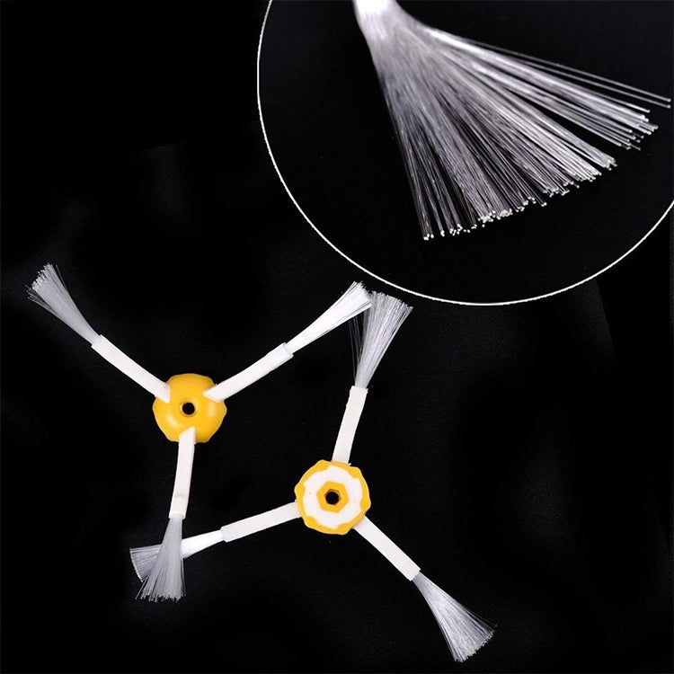 Set of robot side brushes with yellow hubs and white bristle arms