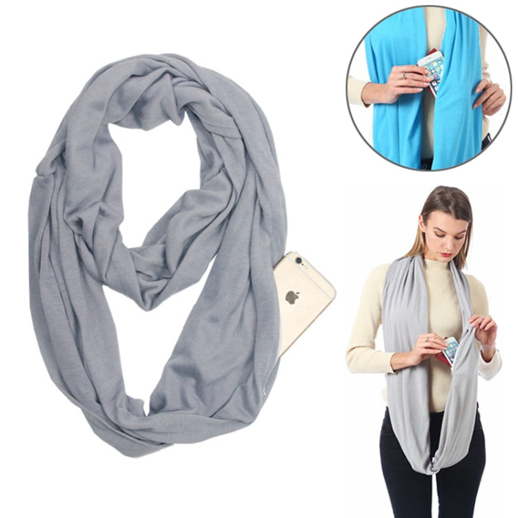 Grey infinity scarf with zipper storage pocket, looped and draped