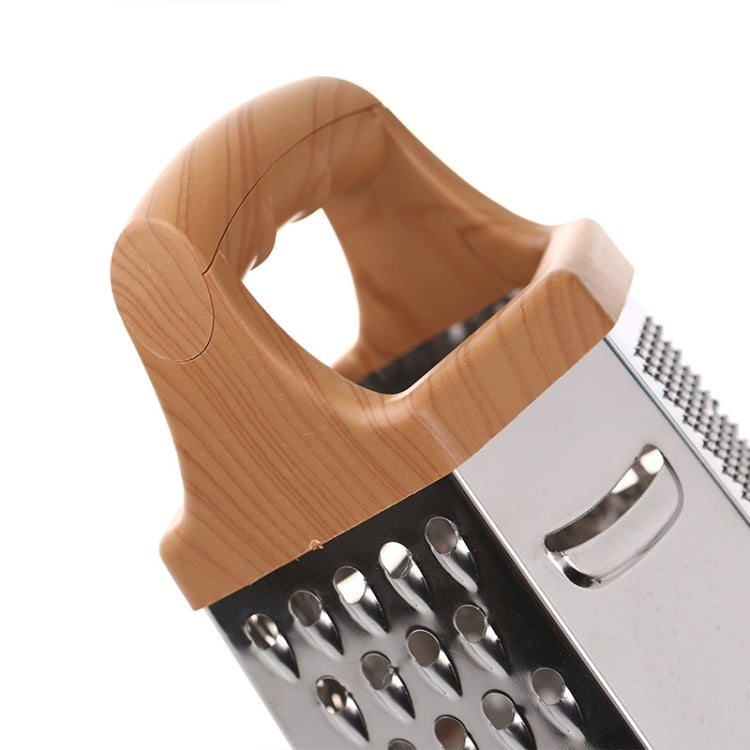 Wood-handled six-sided vegetable chopper with stainless grating side and grip