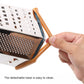 Six-sided vegetable chopper with stainless grater panel and detachable base