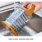 Stainless six-sided vegetable chopper being rinsed in sink for easy cleaning