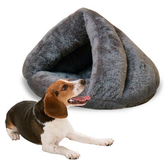 Gray plush triangular pet cave with a wide entrance, shown beside a dog