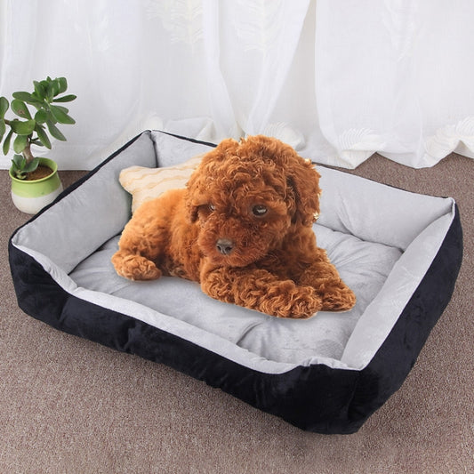Black and gray pet kennel mat with padded plush sides and soft inner cushion