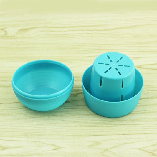 Mini round plastic plant pot in teal blue, vented top on water reservoir base