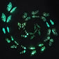 Luminous glow butterfly fridge magnets forming a ring, bright green light