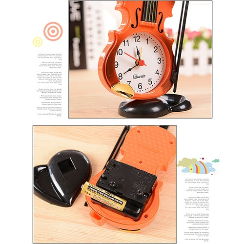 Violin-shaped alarm clock with pen holder in orange, showing back battery compartment