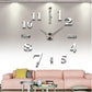 Mirror-style wall sticker clock with silver numerals and reflective center