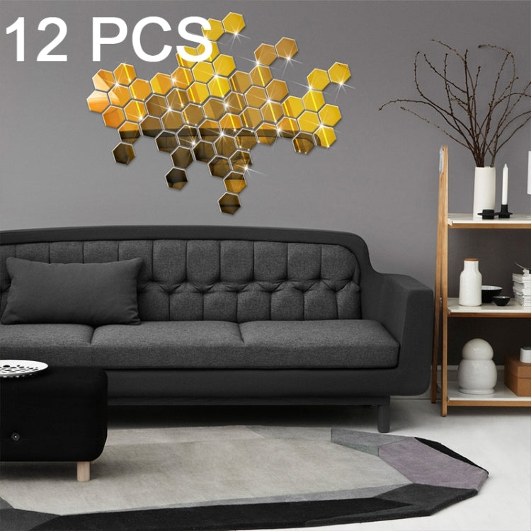 Gold 12-pc hexagonal mirror wall sticker set, 3D hex tiles forming a pattern.
