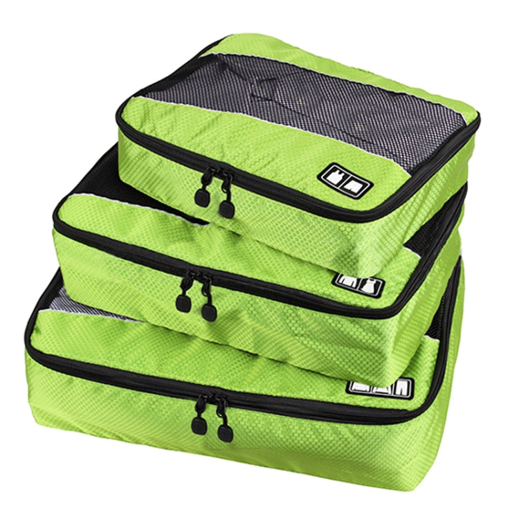 Green 3-piece waterproof travel storage bag set with black zipper closures and mesh top panel