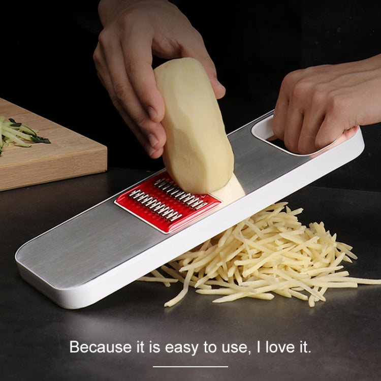 Stainless steel vegetable cutter grater with red grating blade and food grate surface