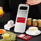 Stainless steel vegetable cutter with red blade insert, plus extra red grater attachment