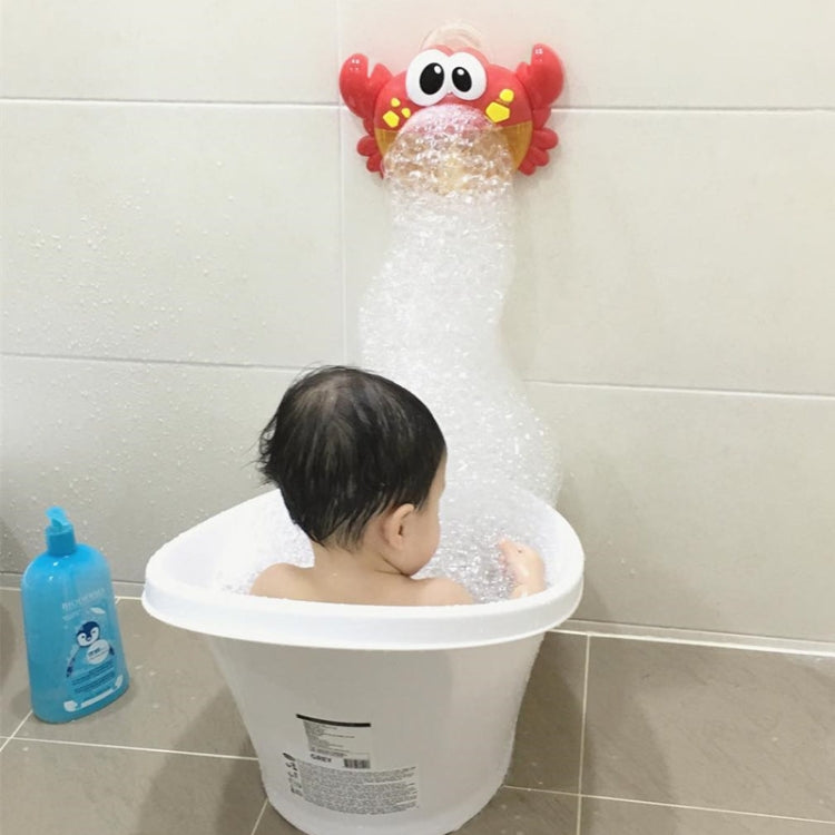 Red crab bubble bath toy with face, dispensing bubbles into a child bath tub