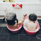 Bubble crab bath toy with red claws, white foam bubbles, and smiling face