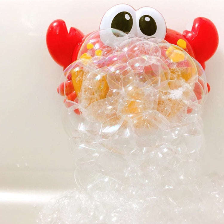 Red crab bubble bath toy releasing lots of bubbles in a bath