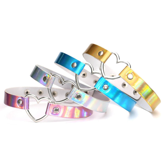 Set of heart-shaped collar choker necklaces in iridescent silver, blue, and gold tones