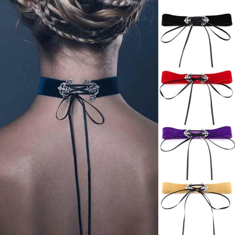 Black velvet choker necklace with silver filigree clasp and tied ribbon ends