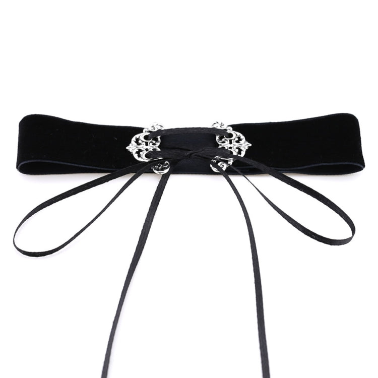Black velvet choker with silver scroll clasp and multiple dangling ribbon straps