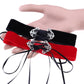 Red and black velvet choker necklaces with silver ornate clasps and ribbon ties
