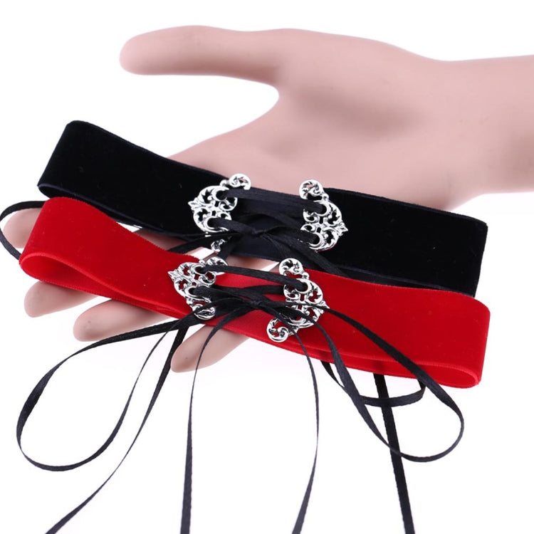 Red and black velvet choker necklaces with silver ornate clasps and ribbon ties