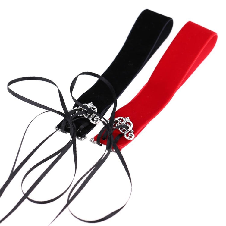 Black and red velvet choker necklaces with silver clasps and hanging ribbon ties