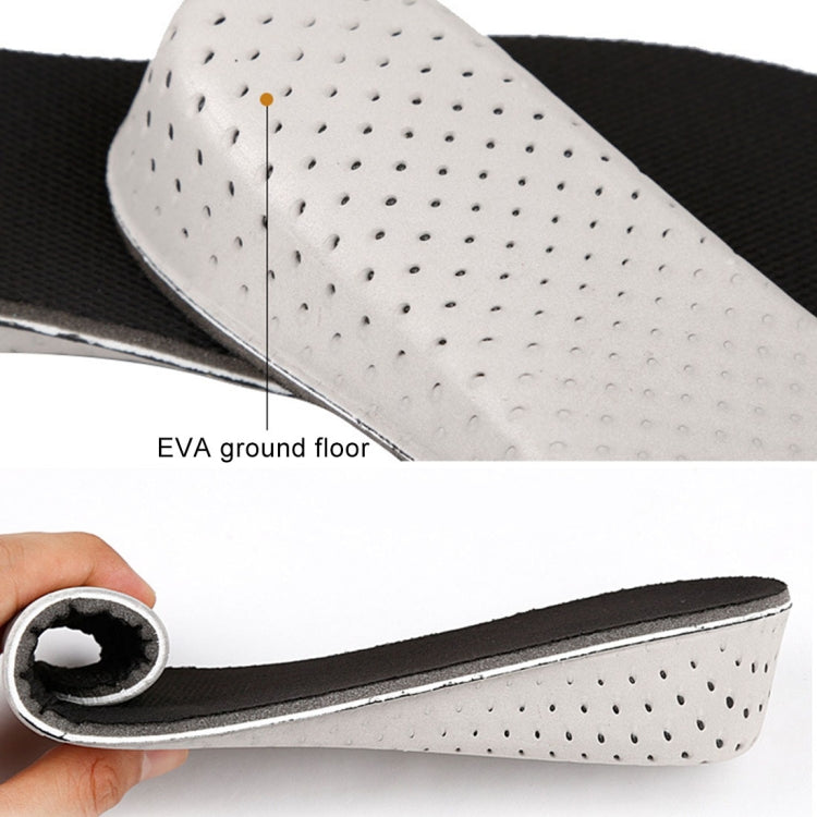 Shoe insole underside with perforated white EVA and black comfort top; held for fit