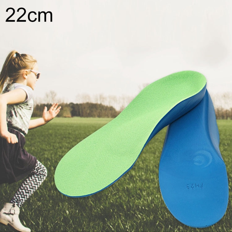Children corrective insole with green top and blue base, shown with a side view.