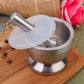 Stainless steel mortar with pestle; translucent cover lifted