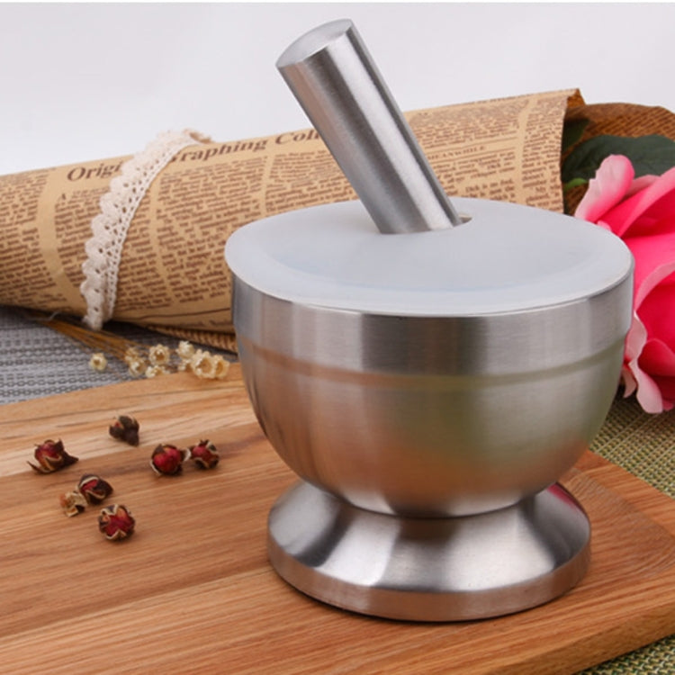 Stainless steel mortar and pestle with white lid