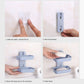 Blue double-deck wall-mounted soap holder installation, hands mounting the bracket