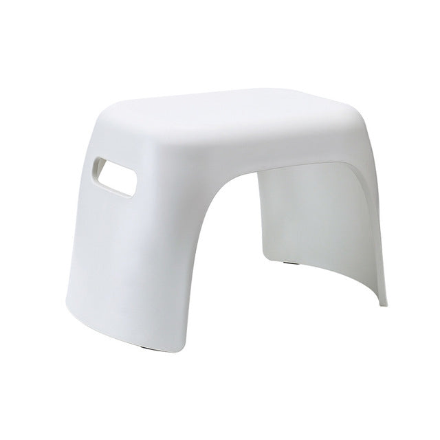 White plastic step stool with side cutout hand grip and contoured seat