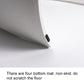 White step stool corner close-up with non-slip pad on the underside