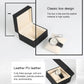 Open PU watch storage box with beige padded insert and wristwatch inside