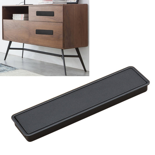 Concealed recessed slot drawer handle, black, on a wooden dresser drawer face